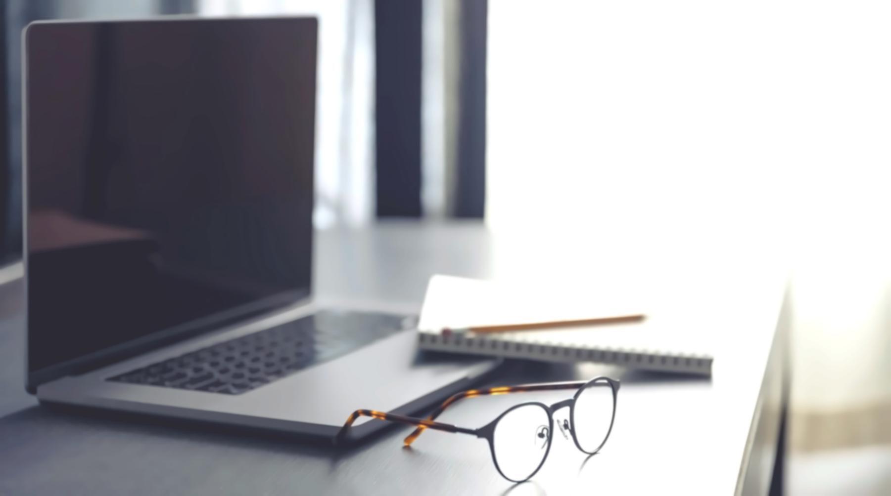 Students working on budgeting exercises with calculators and financial documents